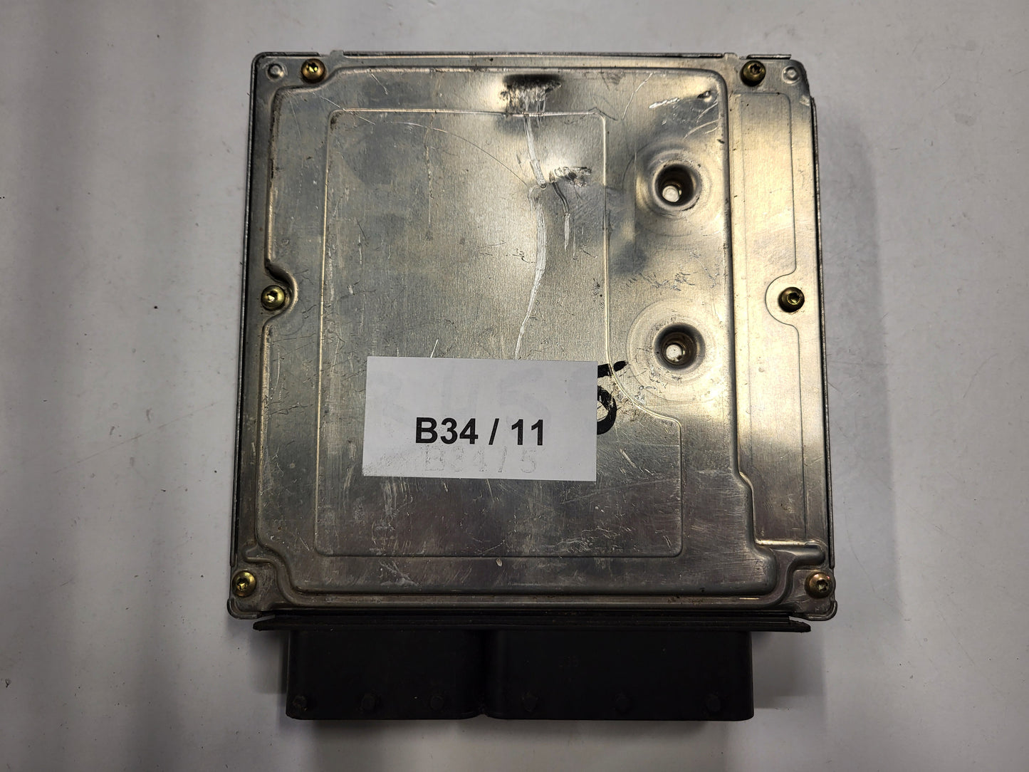 BMW ECU / 0281010565 / DDE7791190 / 7791190 / BOSCH