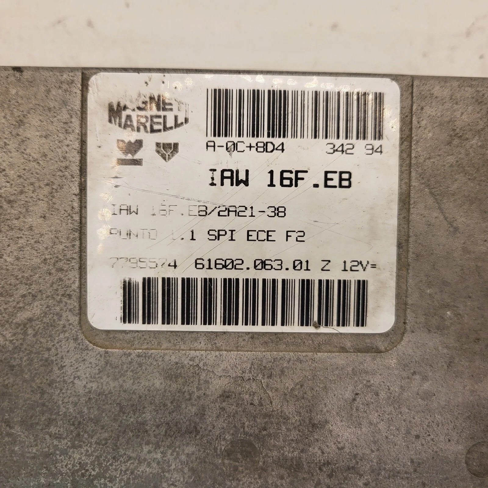 Fiat Punto 1.1 ECU / IAW 16F.EB / 7795574 / 61602.063.01 / MAGNETI MARELLI
