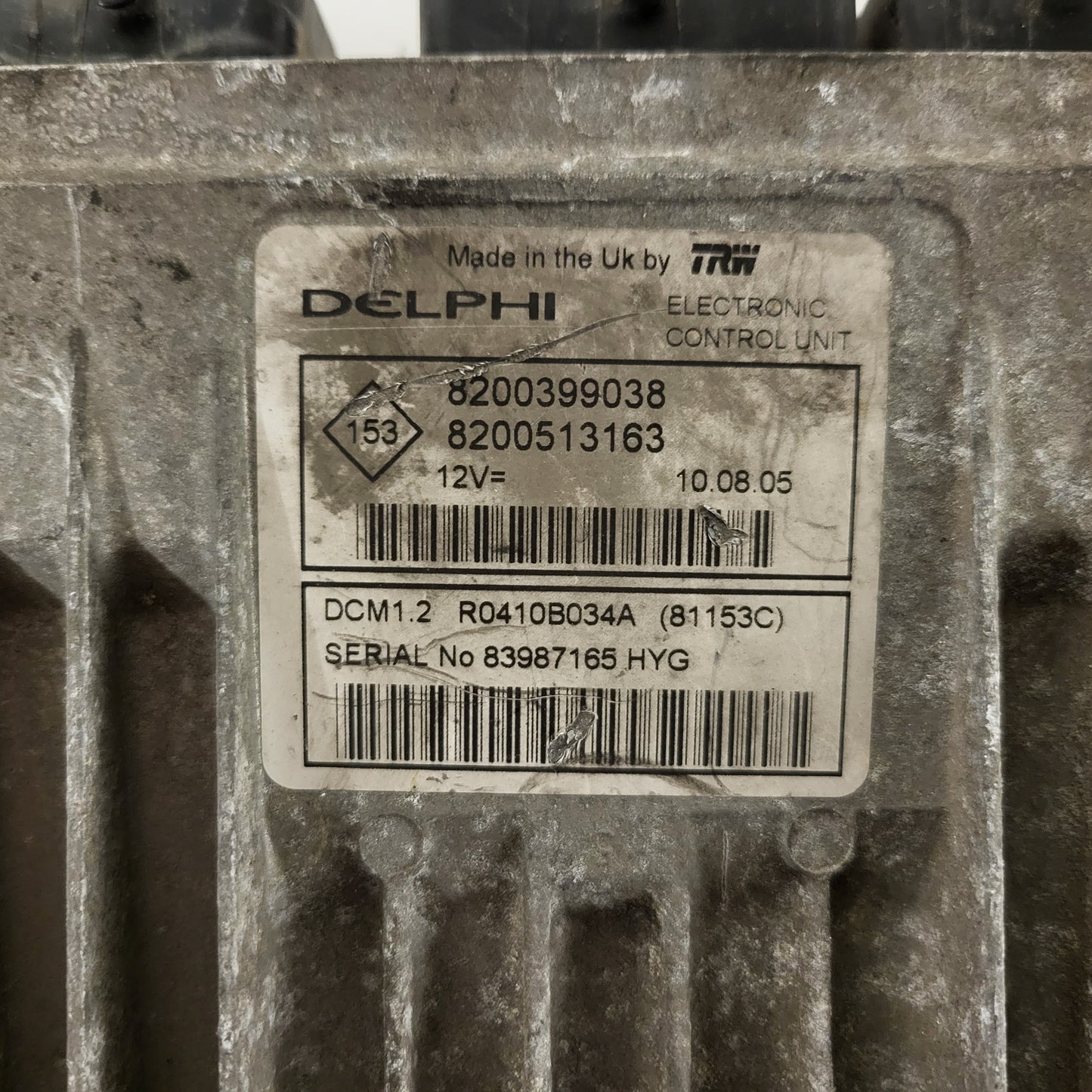 Renault ECU / 8200399038 / 8200513163 / R0410B034A / DCM1.2 / DELPHI